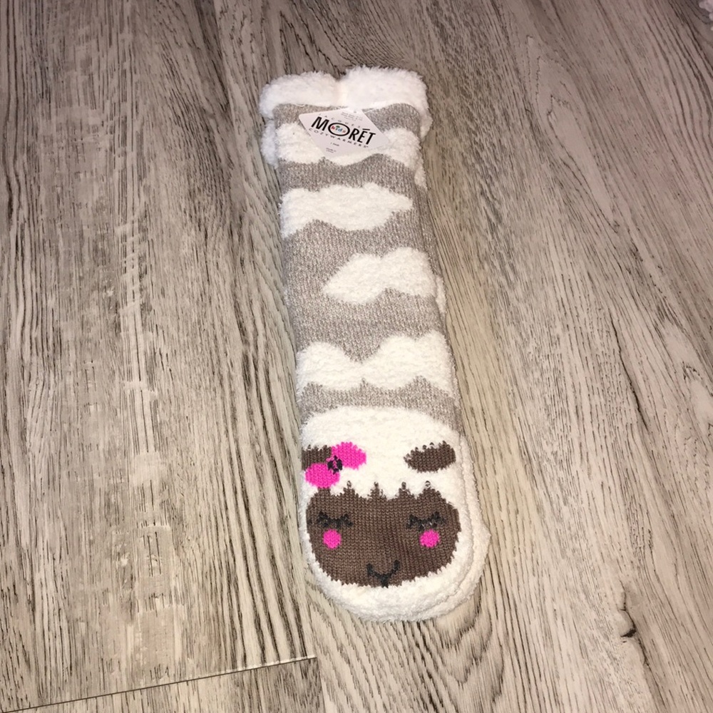 Brown and White Fuzzy Socks with Animal on Foot